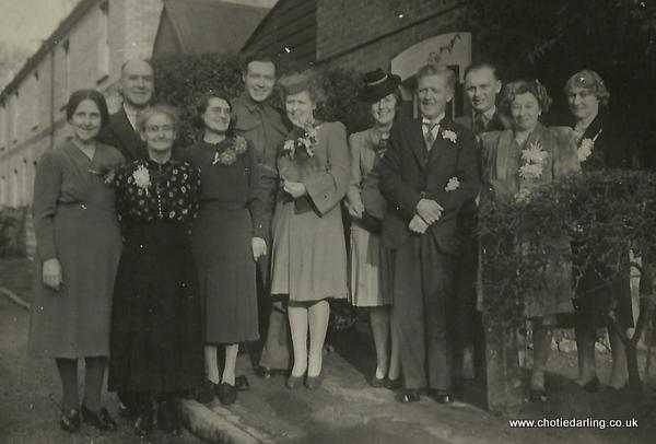 Ted & Margaret's wedding group outside the Hollies