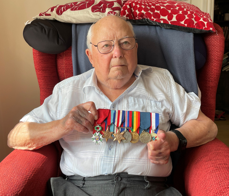 Tony Rampling with his war medals